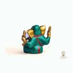 Resin Ganesha Statue — Stone-Chip Inlay
